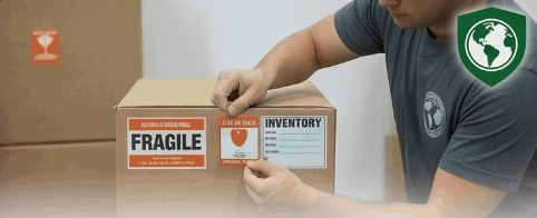 World Class team member labeling a box for inventory